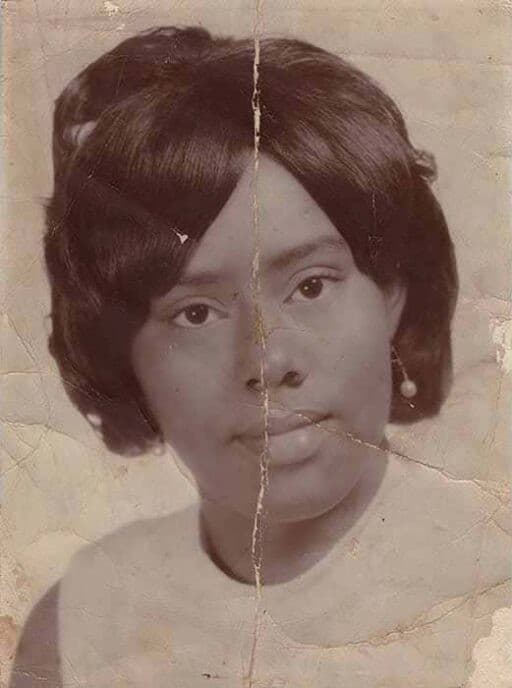 Damaged keepsake portrait before restoration