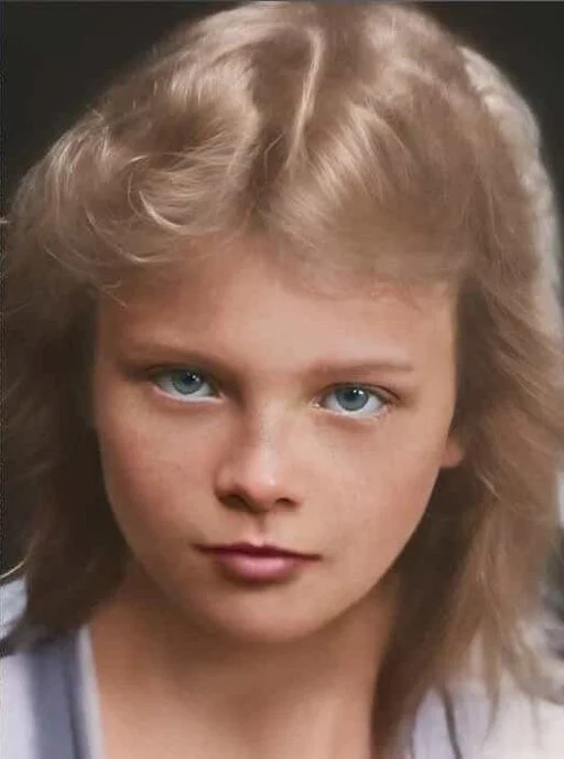 Restored child portrait after AI old photo restoration