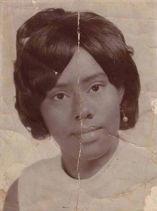 Scratched keepsake portrait before AI photo repair